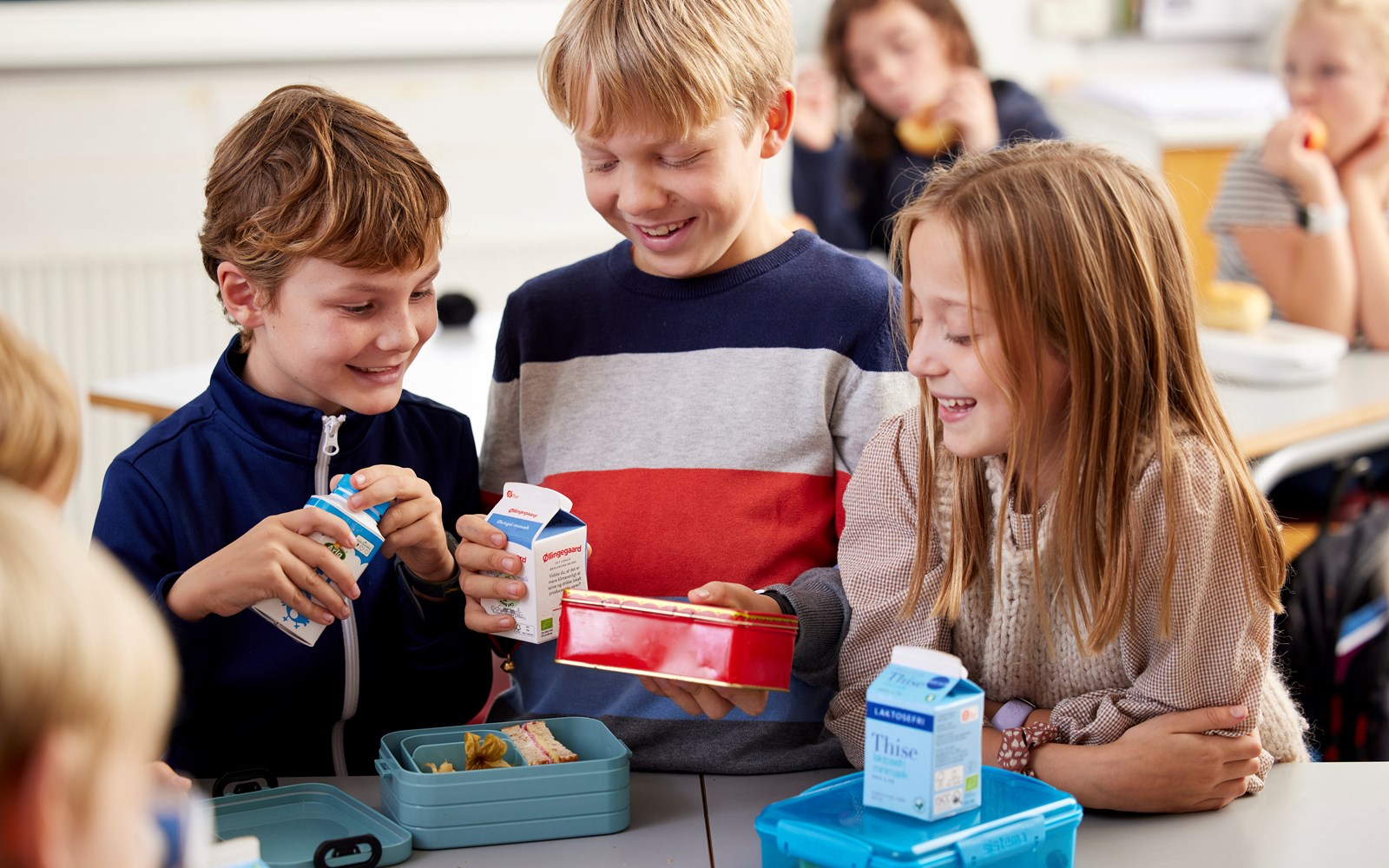Children drinking milk during lunch break